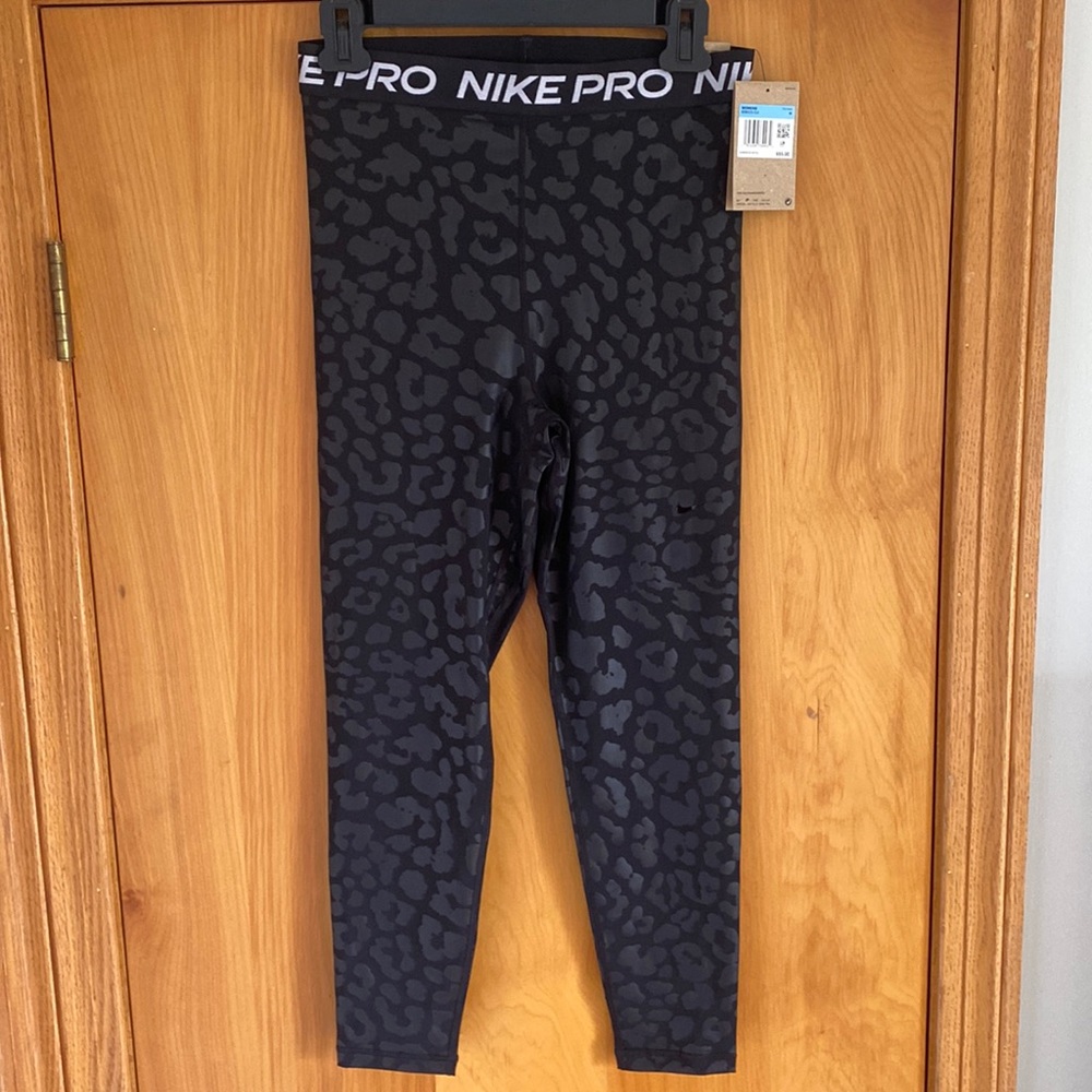 Nike Pro Dri-Fit leggings NWT. Black with subtle black on black leopard print.